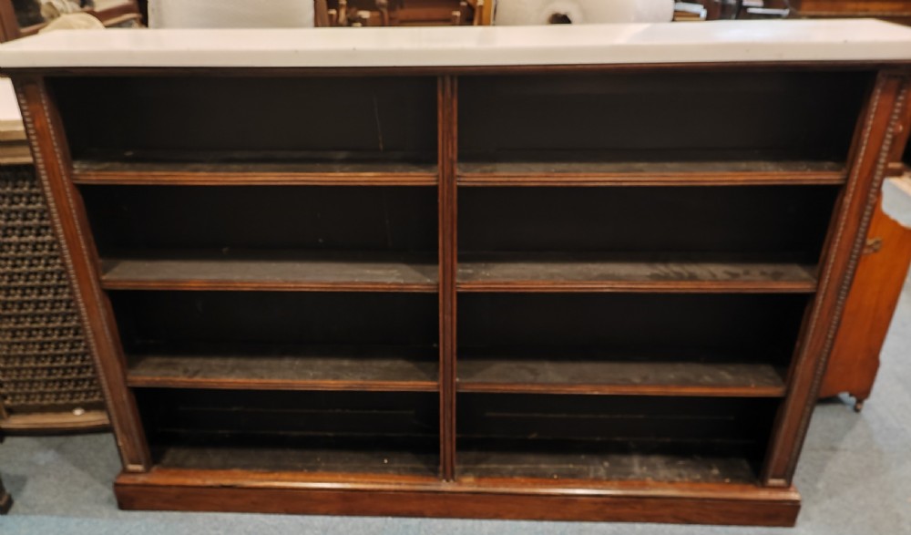 Regency rosewood open bookcase with original white marble top.