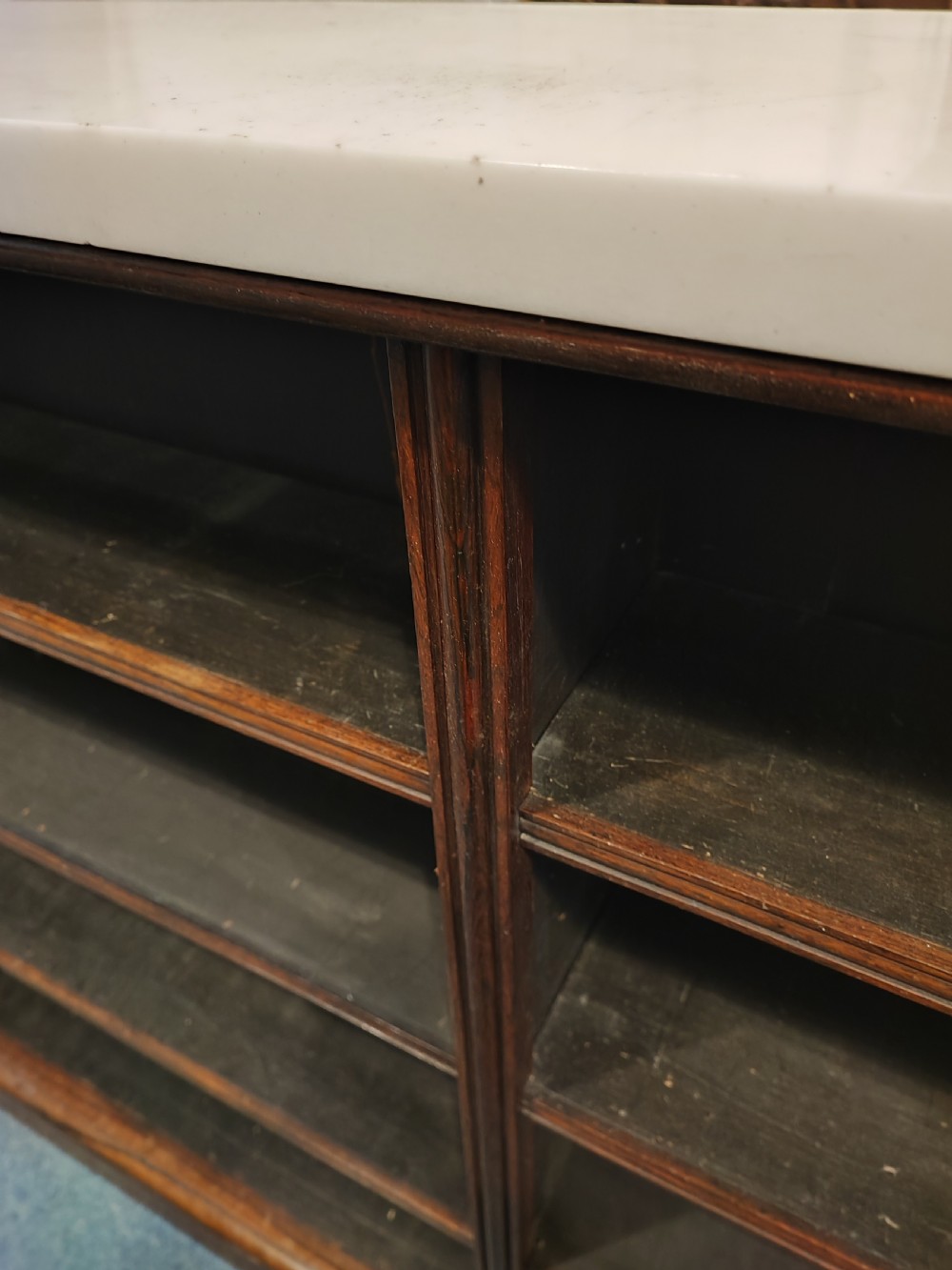 Regency rosewood open bookcase with original white marble top. View III