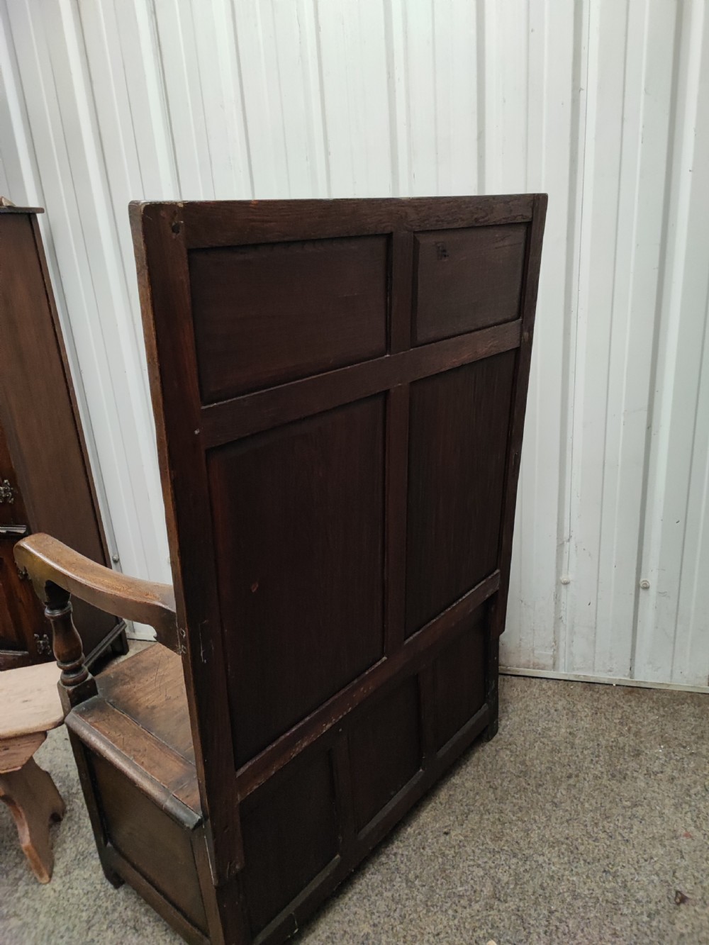 Antique high back oak settle. View XIV
