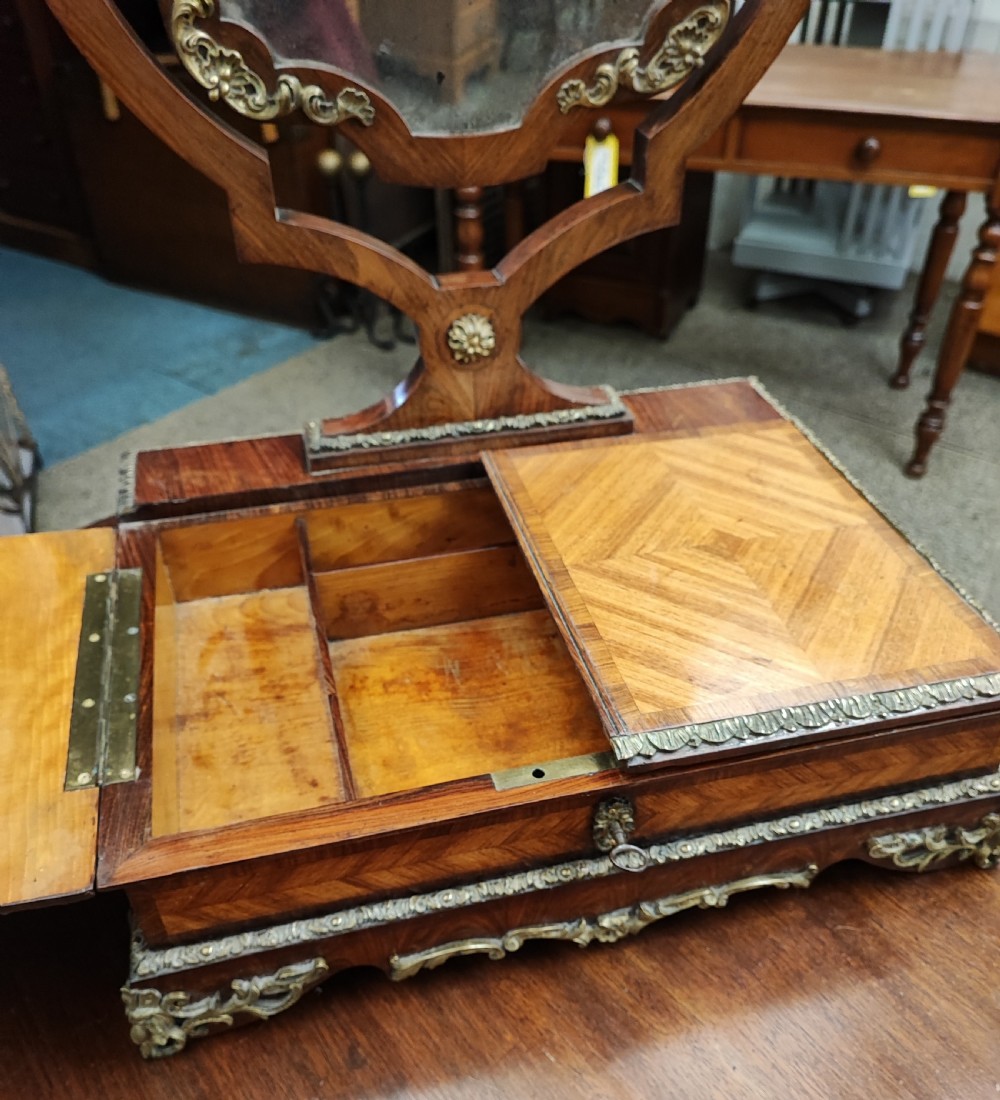 A fine French Kingwood and ormolu dressing mirror. View XIV
