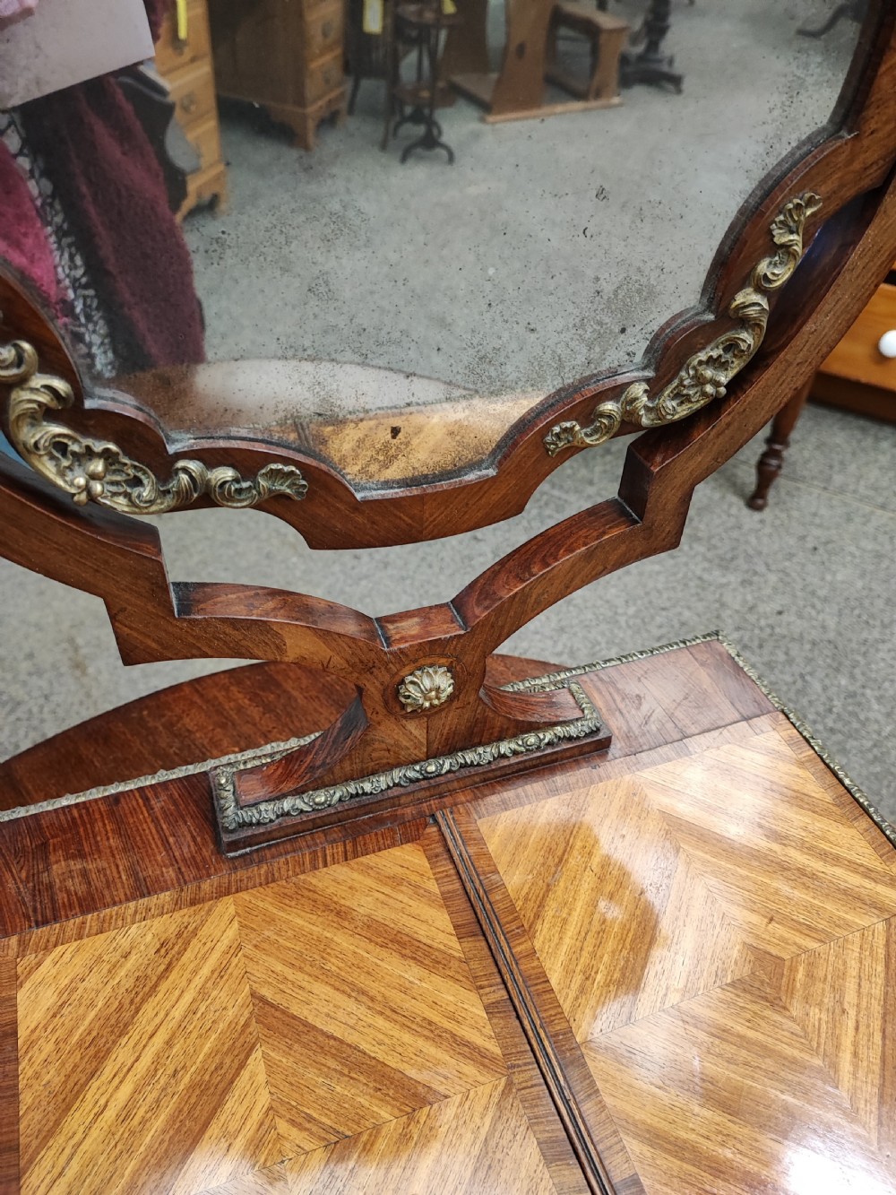 A fine French Kingwood and ormolu dressing mirror. View XVIII