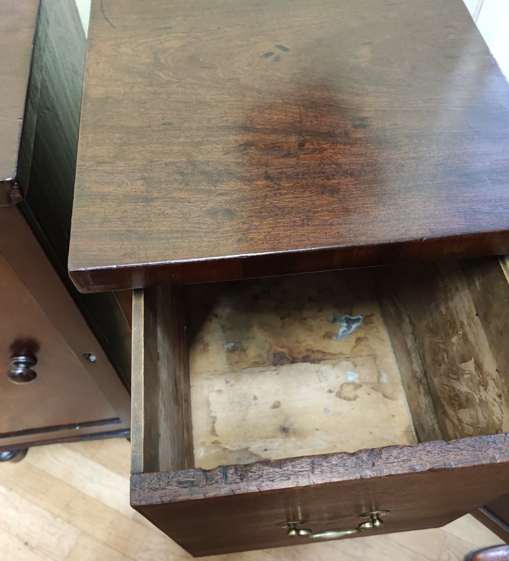 A pair of Regency mahogany bedside cabinets. View X