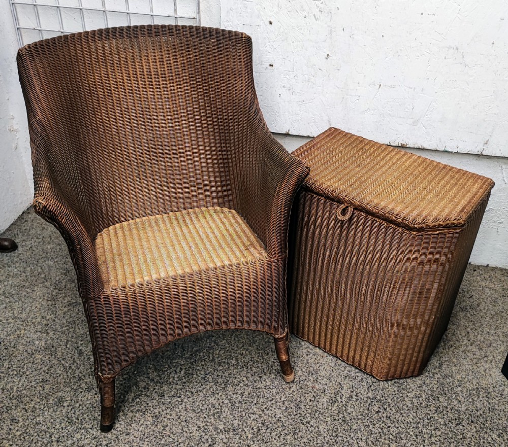 Antique Lloyd loom chair and laundry basket.
