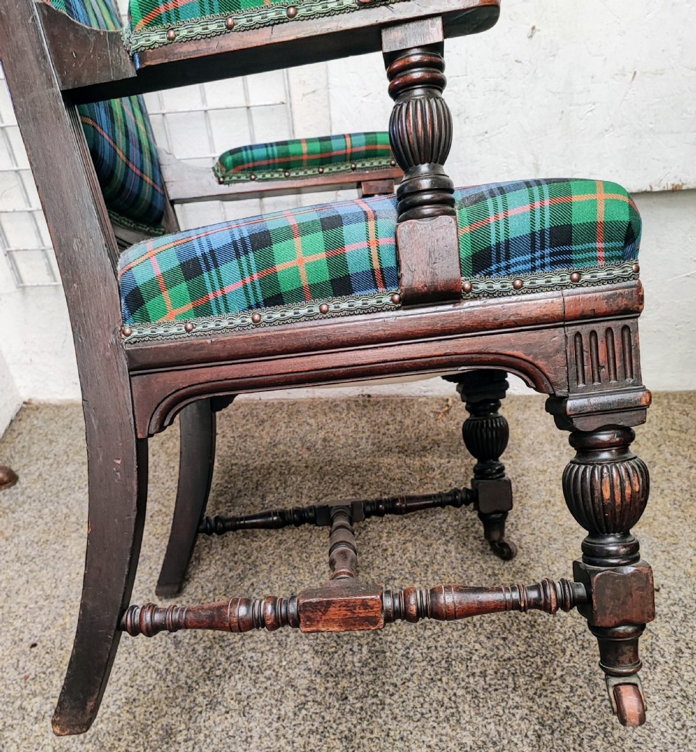Antique baronial mahogany desk or library armchair. View VII