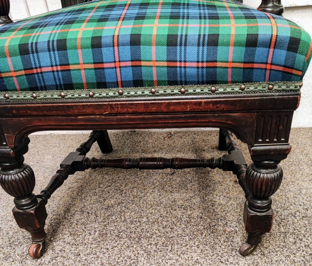 Antique baronial mahogany desk or library armchair. View IX