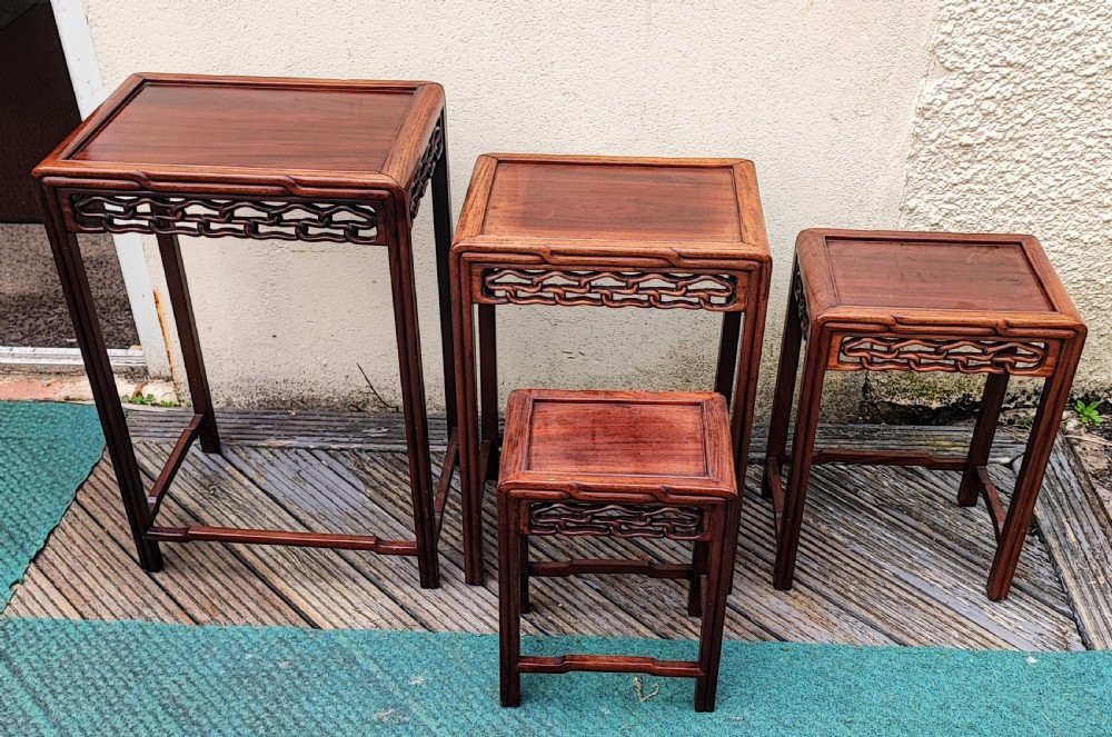 Antique Chinese nest of 4 occasional hardwood tables.