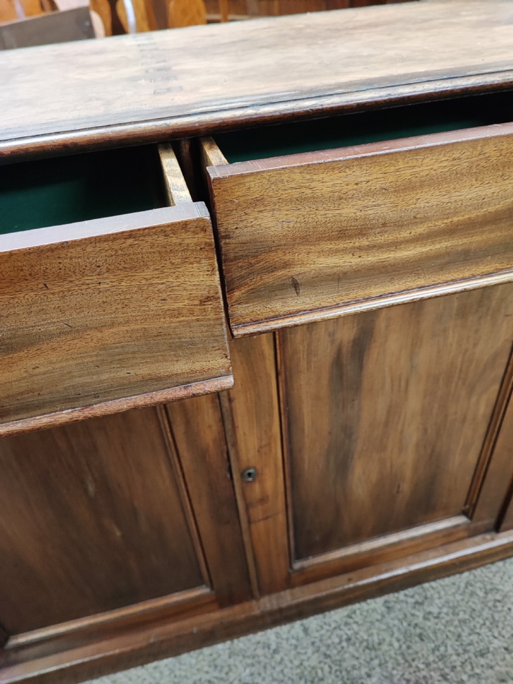 A fine Regency marble top mahogany side cabinet. View II