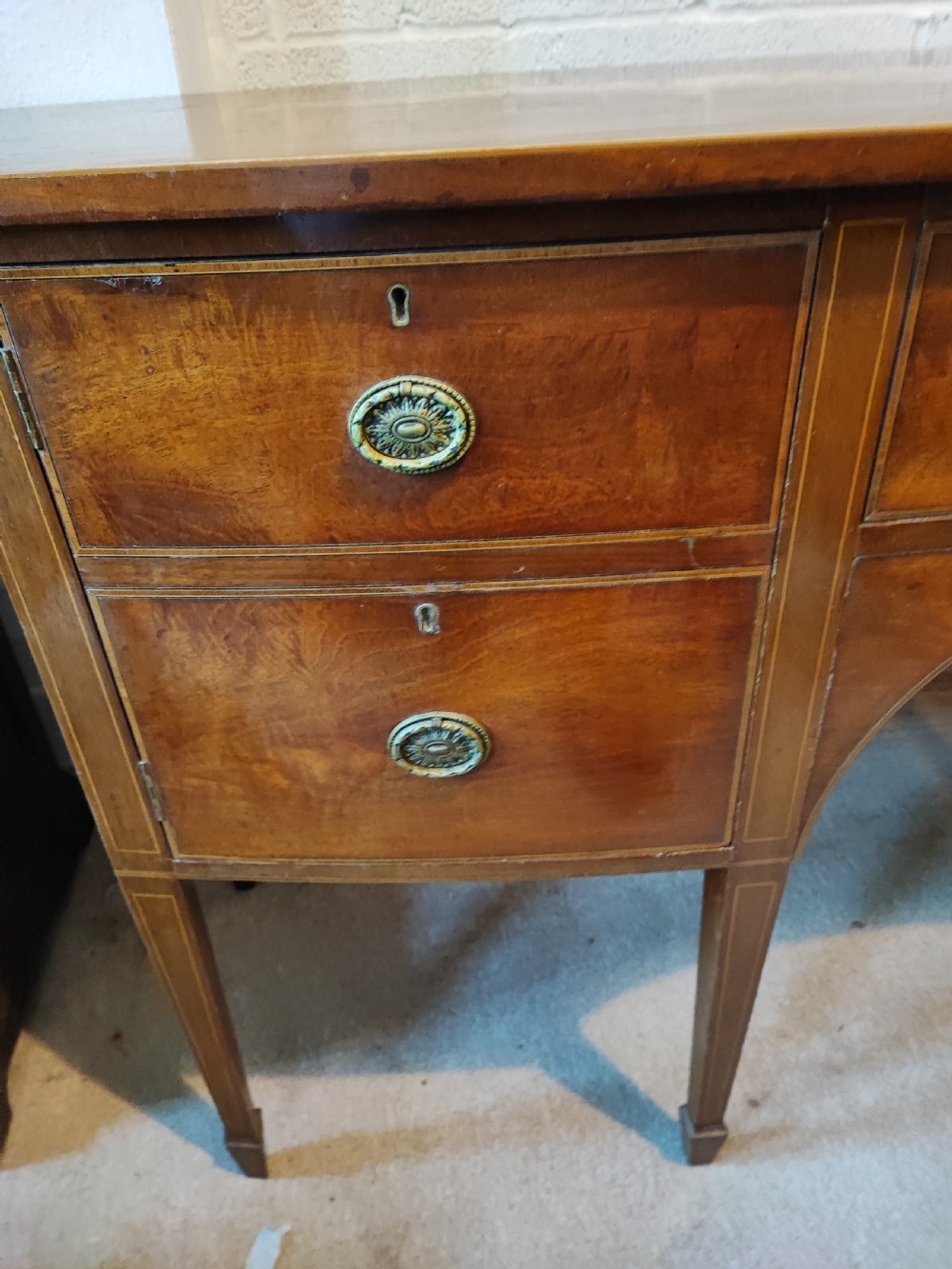 Antique inlaid mahogany bow front sideboard in the George III style. View II