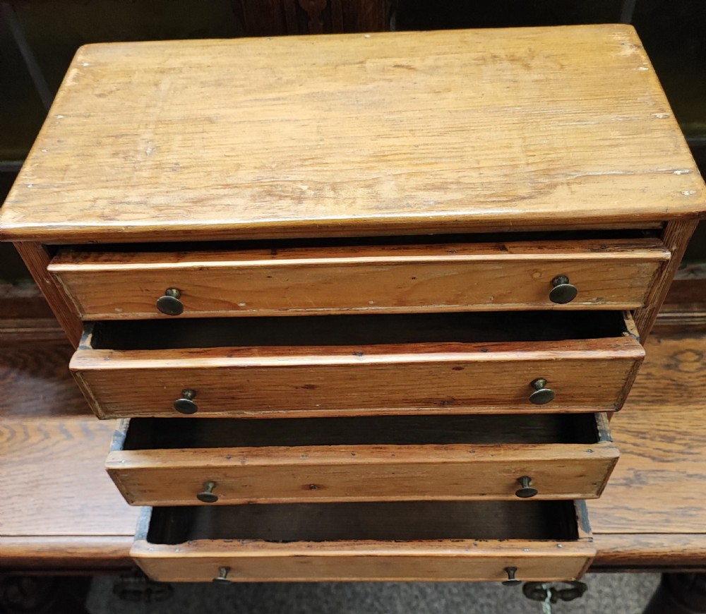 19c miniature pine chest of drawers. View II