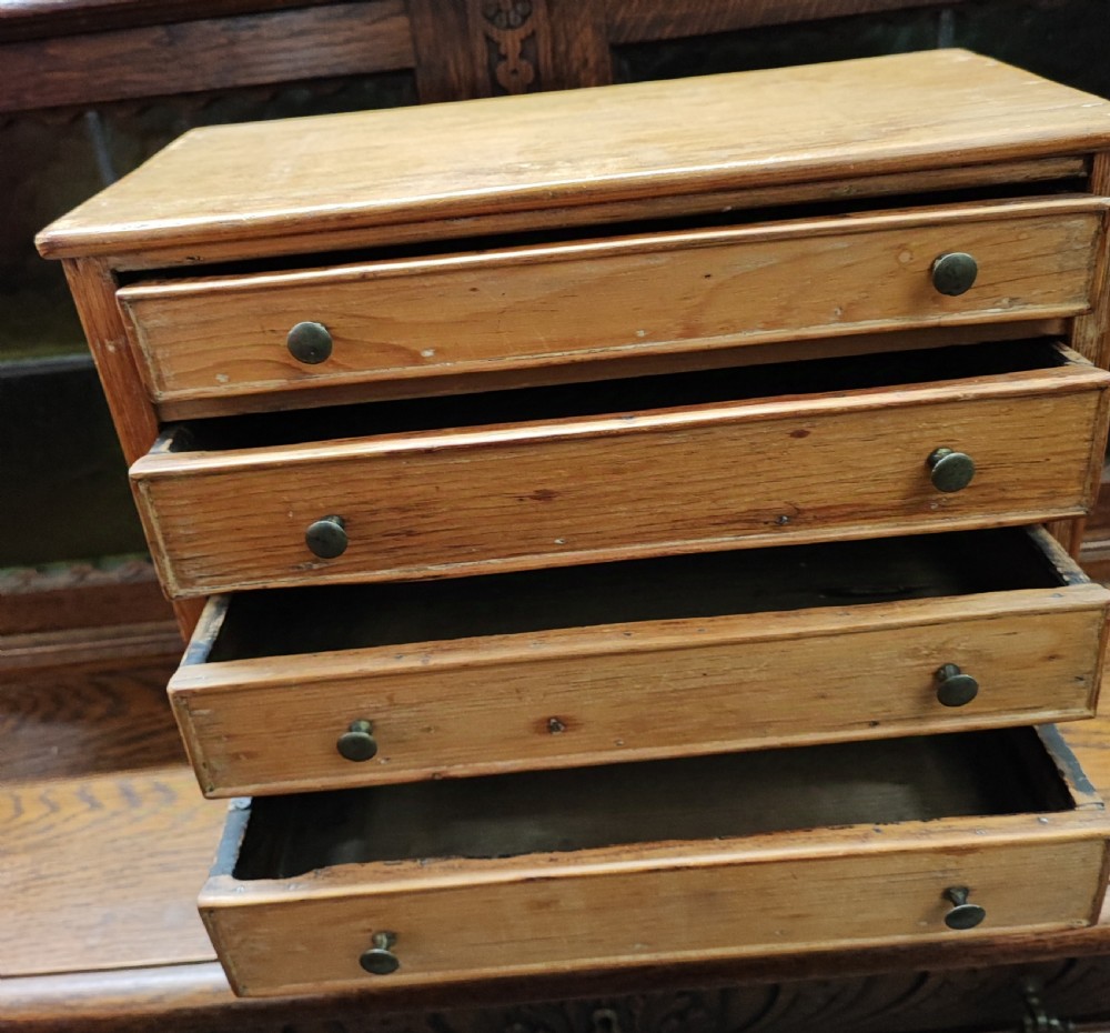 19c miniature pine chest of drawers. View III
