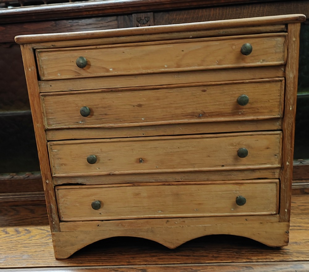 19c miniature pine chest of drawers. View IV