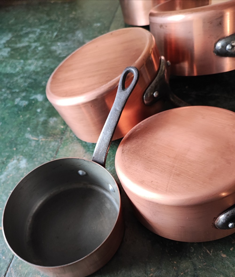 An antique Set of 5 French graduated copper and iron pans View IV
