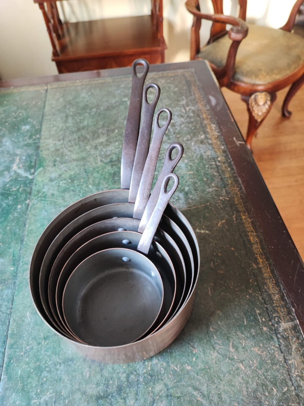 An antique Set of 5 French graduated copper and iron pans View XIV