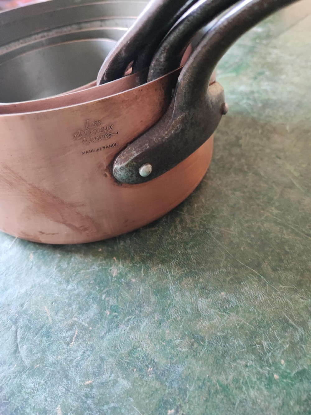 An antique Set of 5 French graduated copper and iron pans View XV