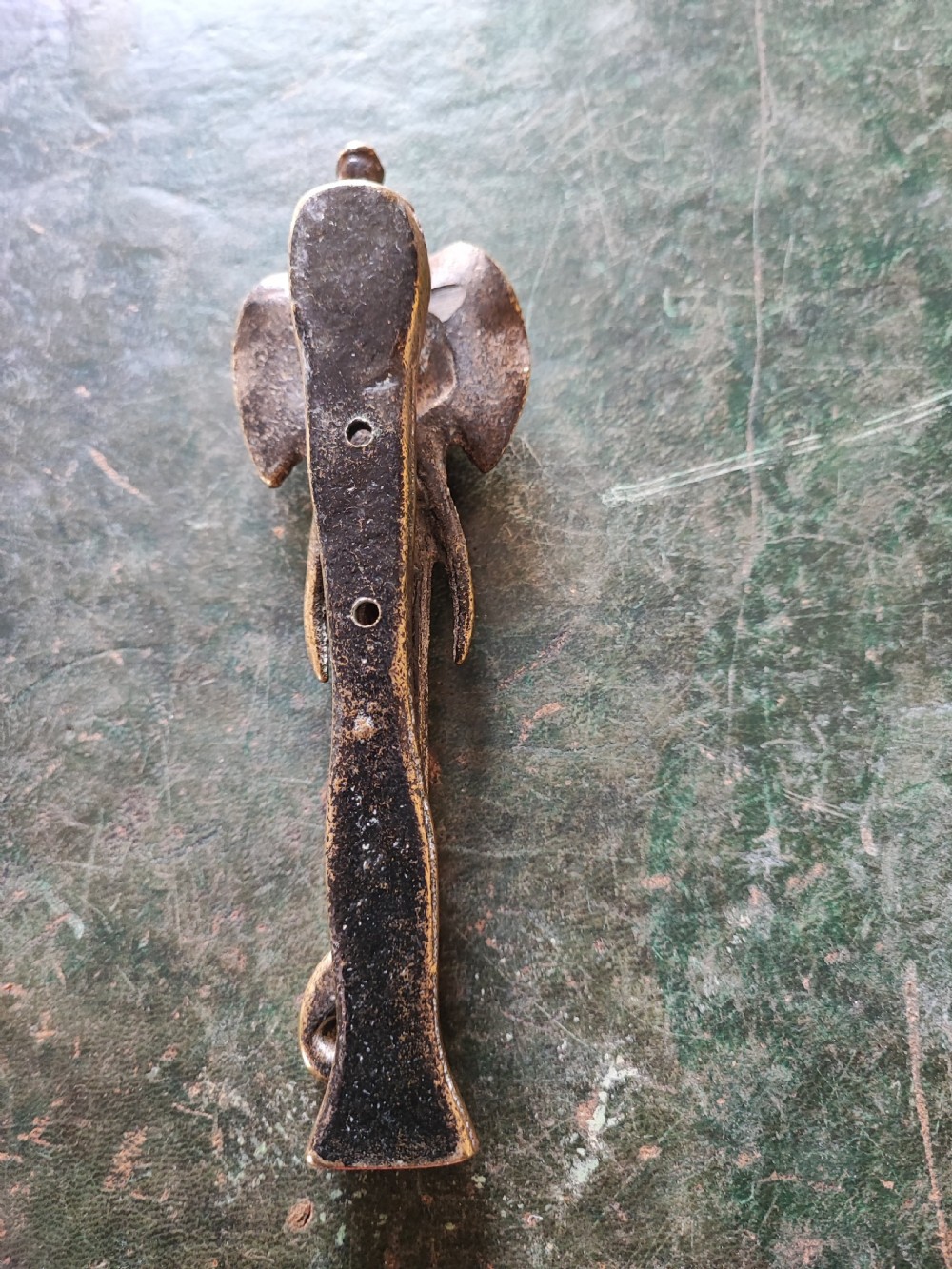 A Victorian brass elephant door knocker. View IV