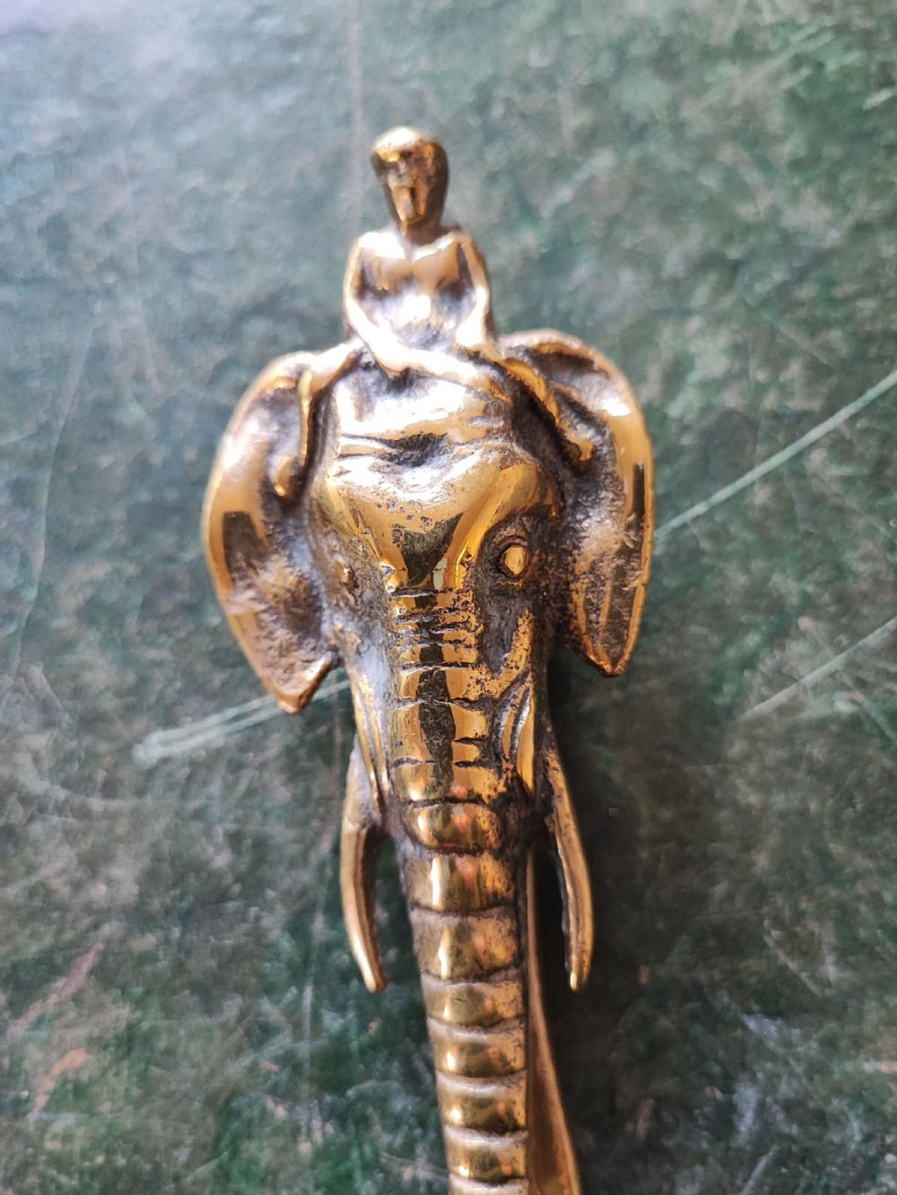A Victorian brass elephant door knocker. View VII