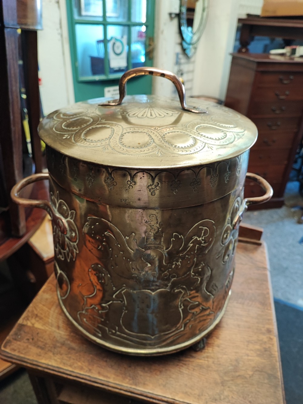 Antique brass armorial log or call bin