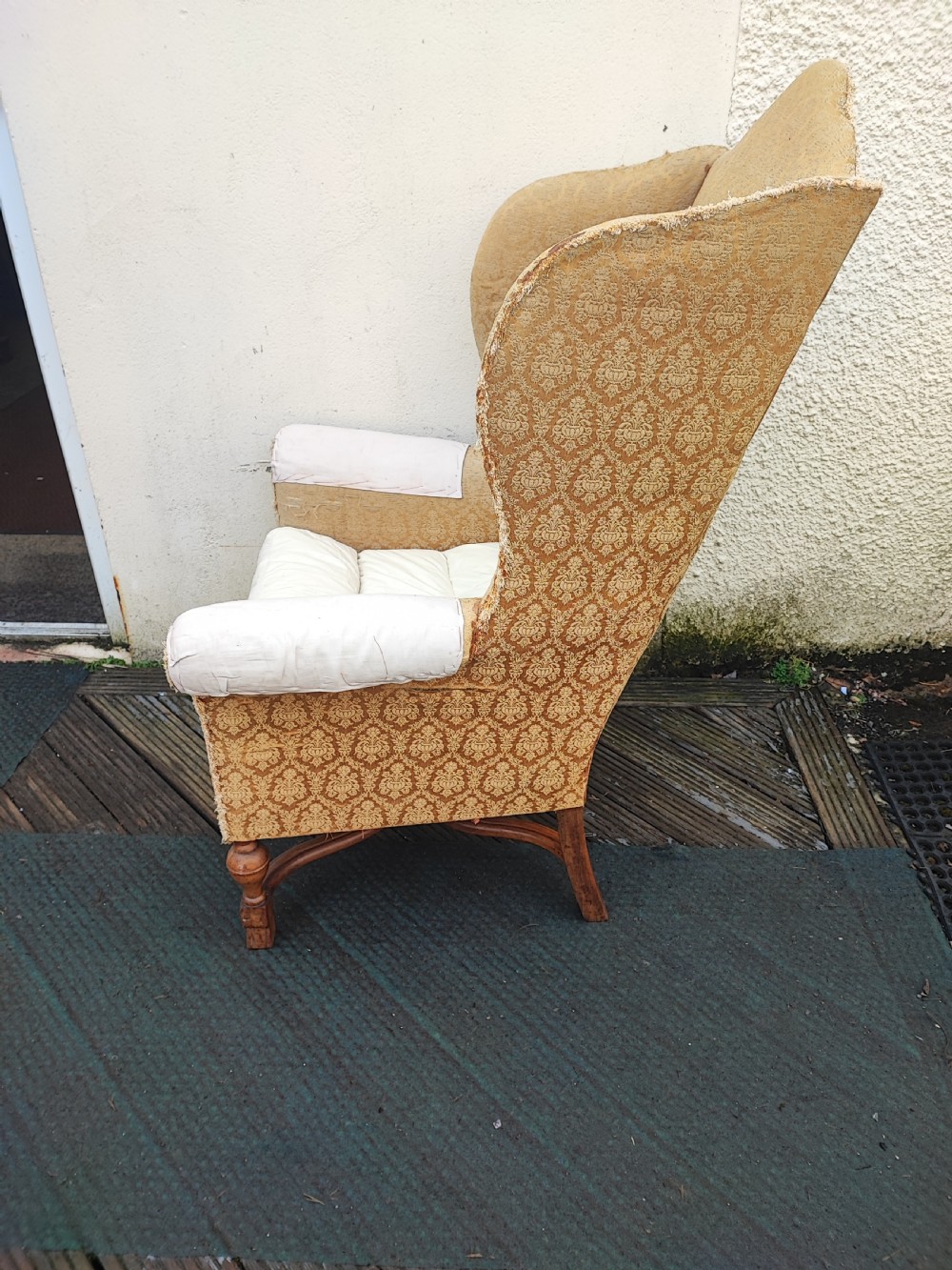 Substantial antique walnut wing chair,for reupholstery. View III