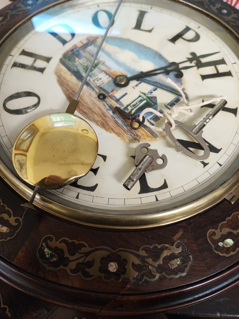 A quality mother of pearl and brass inlaid fusee drop dial wall clock. View VII