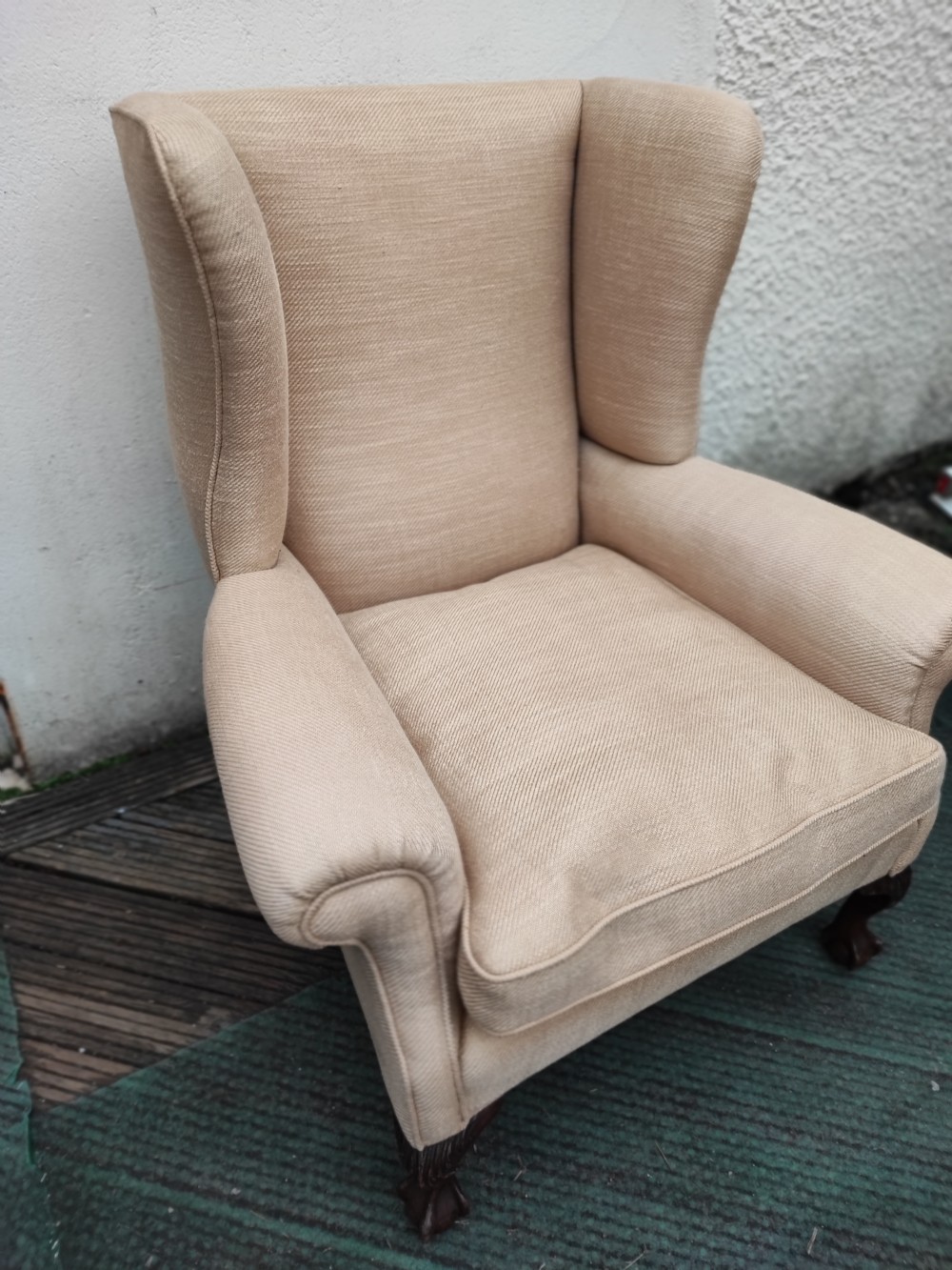 A 19c carved mahogany wing chair. View II
