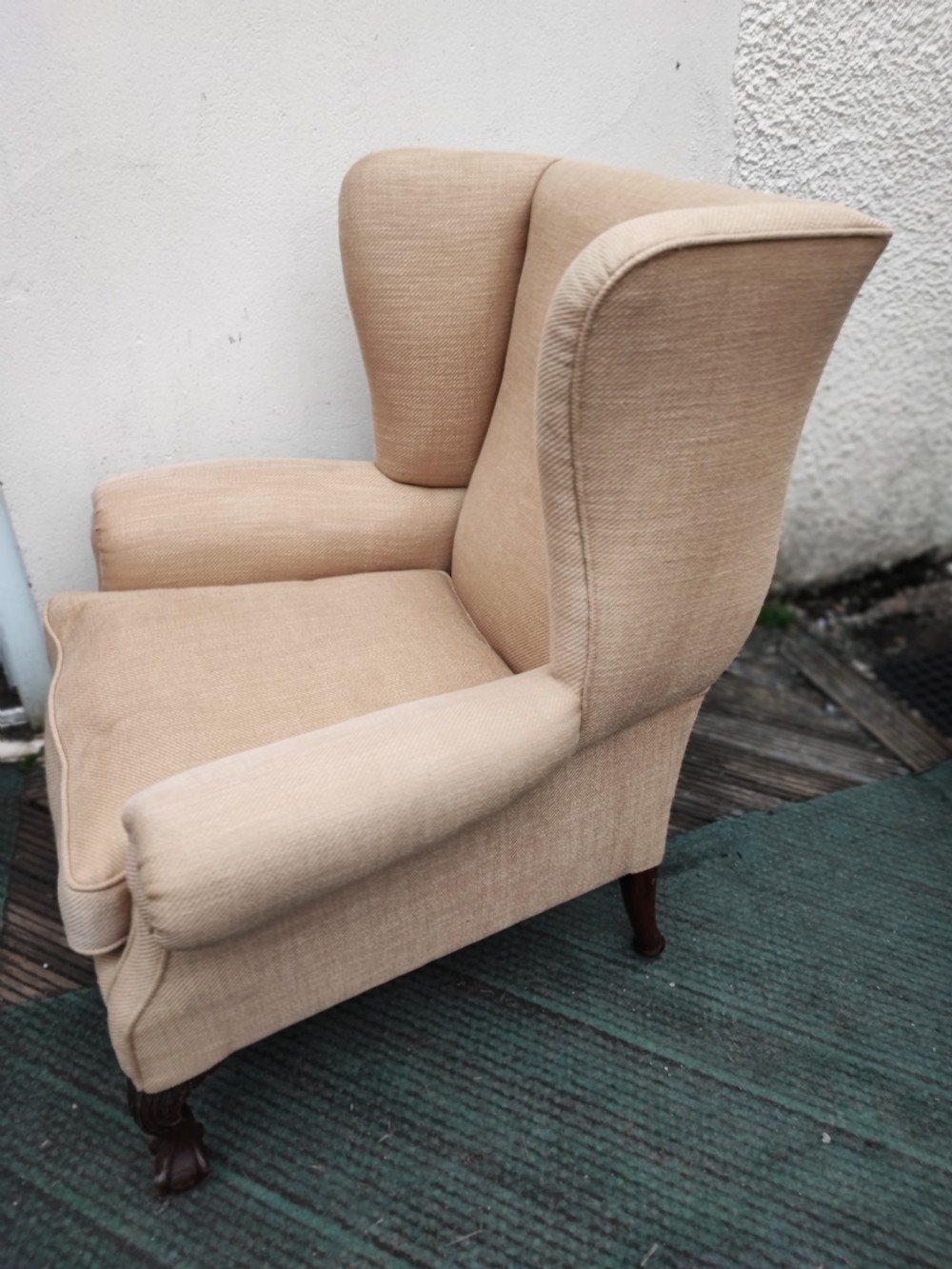A 19c carved mahogany wing chair. View III
