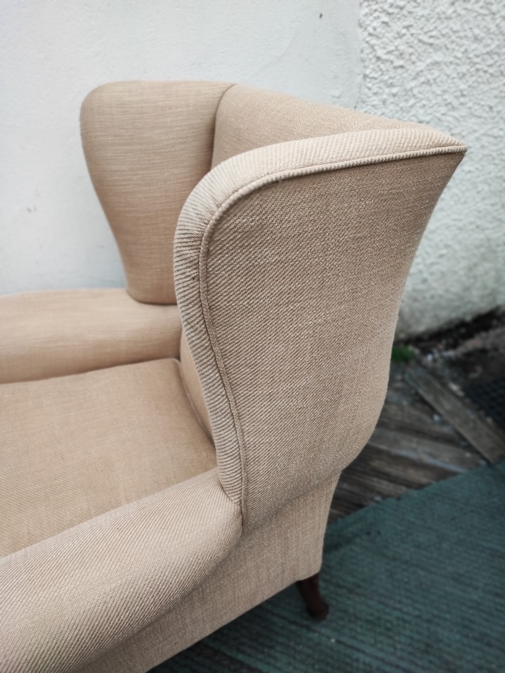 A 19c carved mahogany wing chair. View IV
