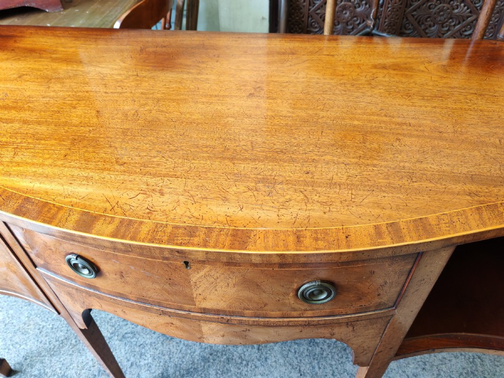 Antique mahogany, serpentine and inlaid sideboard in the George III style. View VI