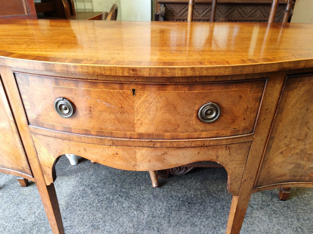Antique mahogany, serpentine and inlaid sideboard in the George III style. View VIII