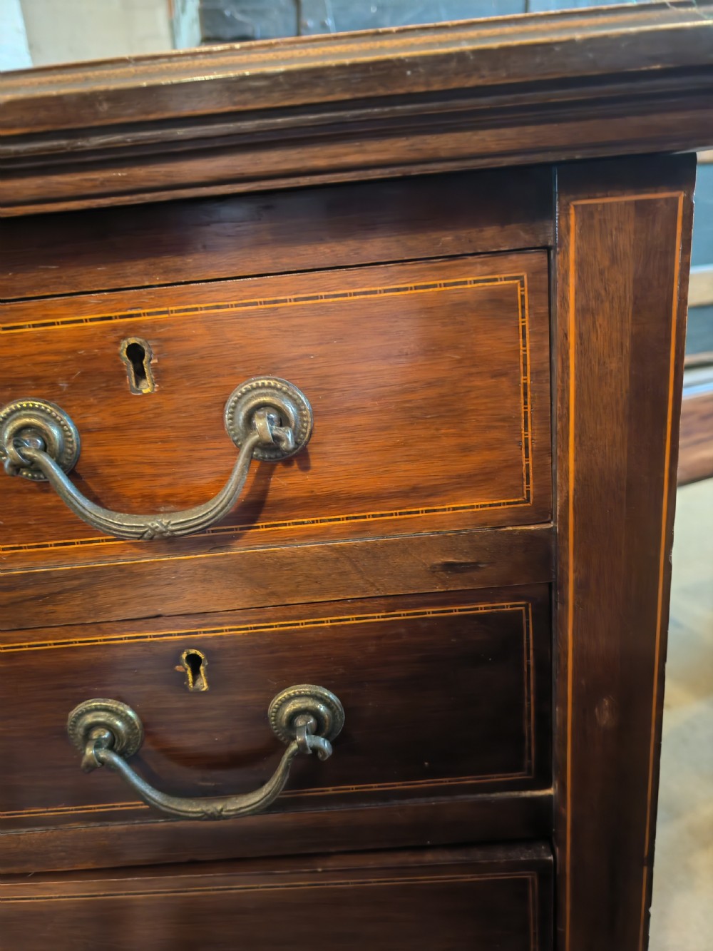 Edwardian inlaid mahogany chest of drawers. View XI
