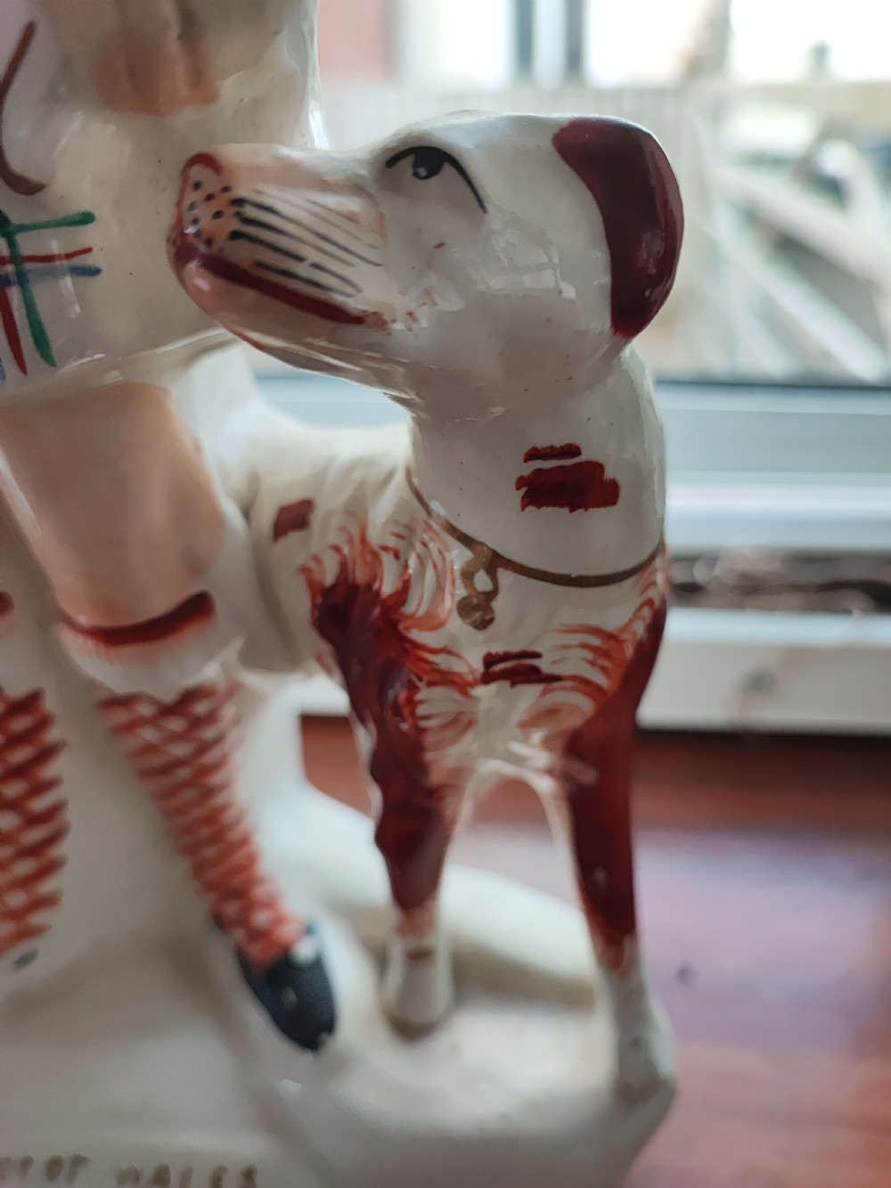 Victorian Staffordshire earthenware figure depicting the Prince of Wales in Scottish Highland attire alongside a hound. View III