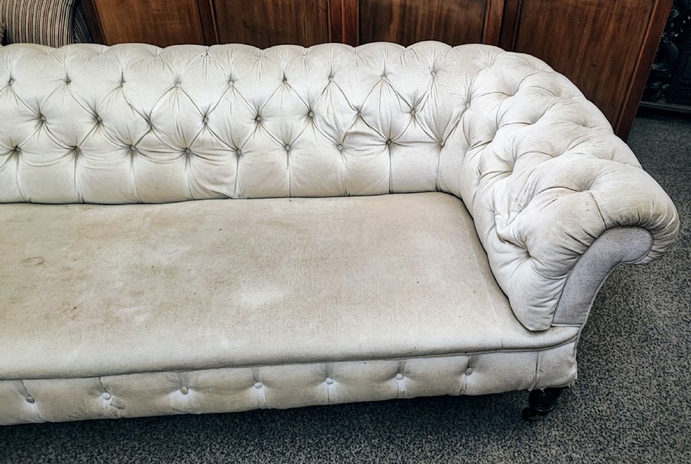 A large Victorian chesterfield sofa. View II