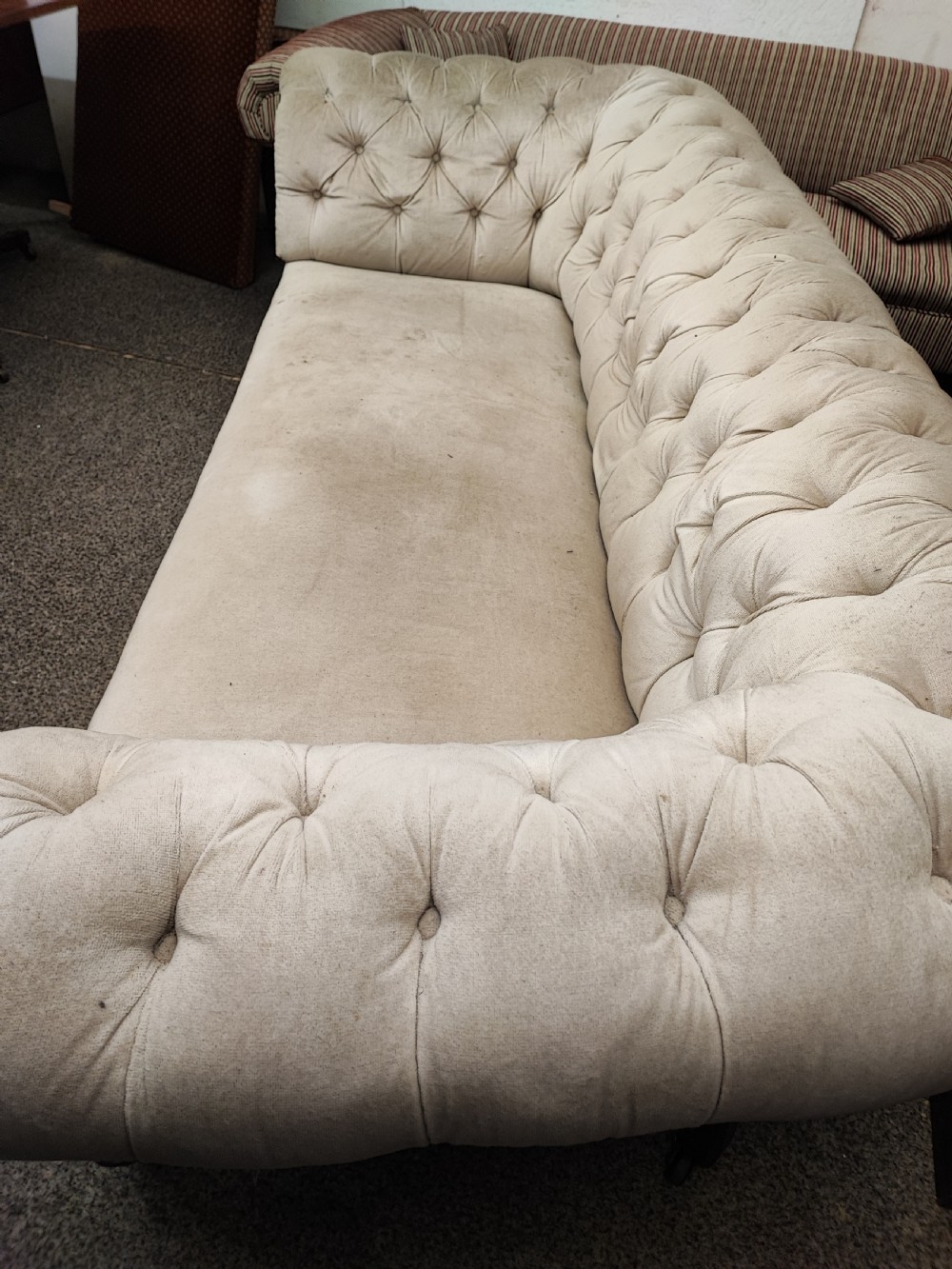 A large Victorian chesterfield sofa. View IV