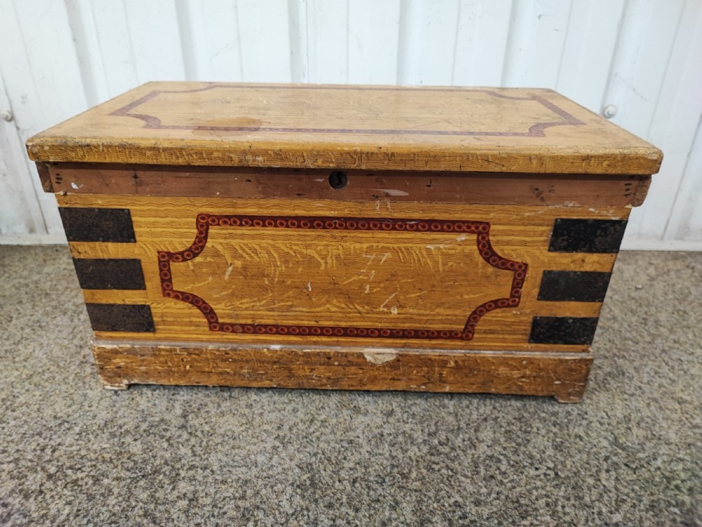 19c small pine trunk with original paintwork.