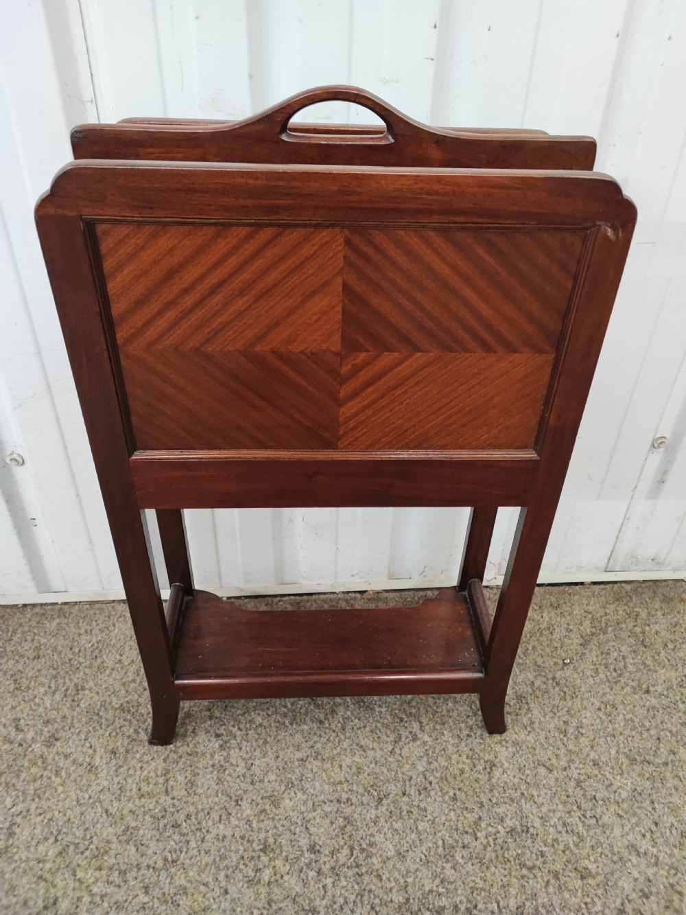 A quality antique mahogany magazine or paper rack.