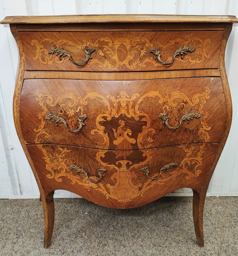 Pretty antique French marquetry bombe chest.