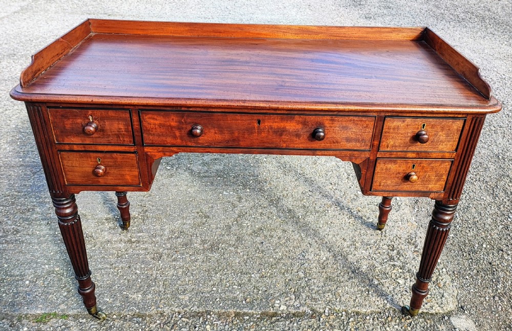 Superb Regency mahogany writing table.