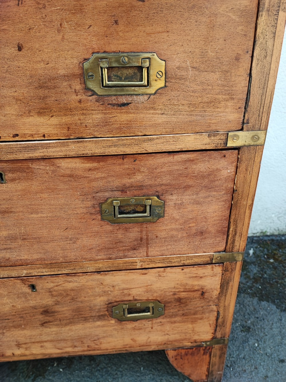 A small antique fruitwood military chest. View IV