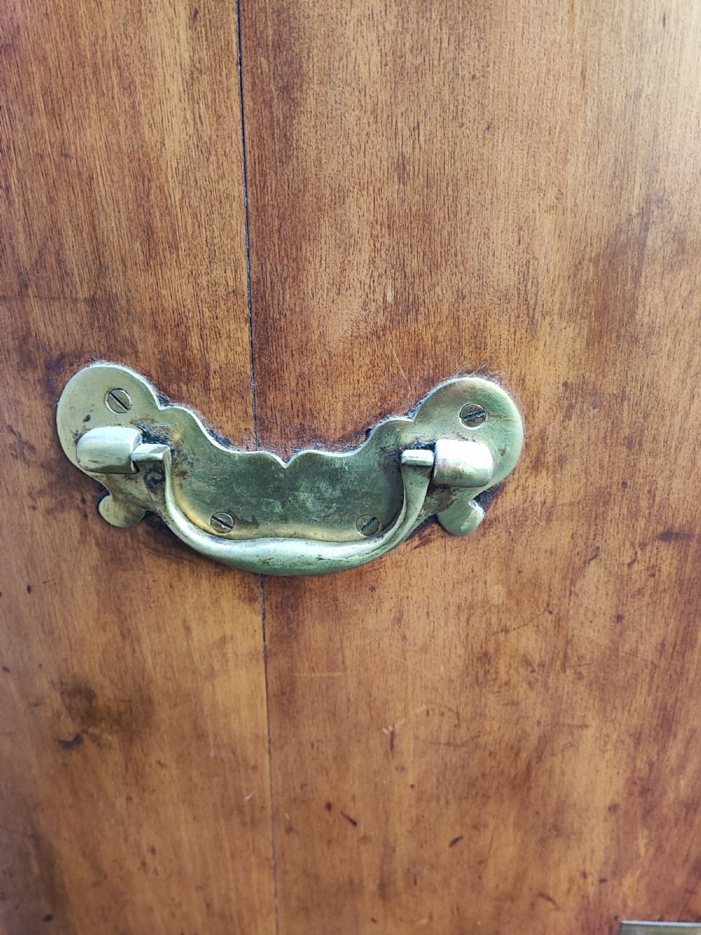 A small antique fruitwood military chest. View VI