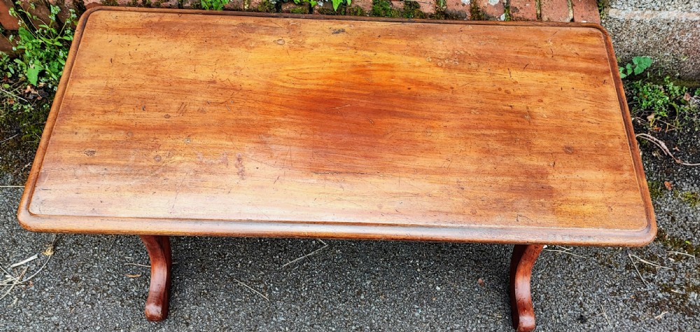 A Victorian mahogany stretcher coffee table. View III