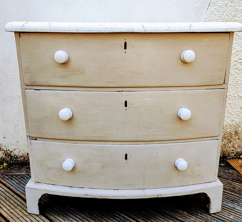 Georgian,painted small chest of drawers with bow front.