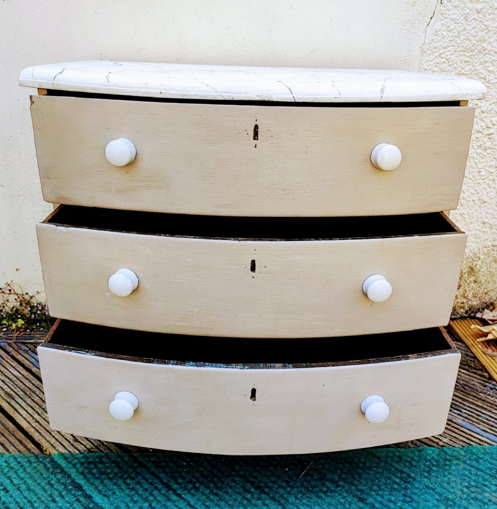 Georgian,painted small chest of drawers with bow front. View III
