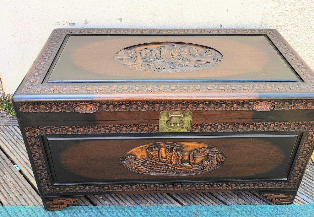 Oriental carved camphor trunk. View V