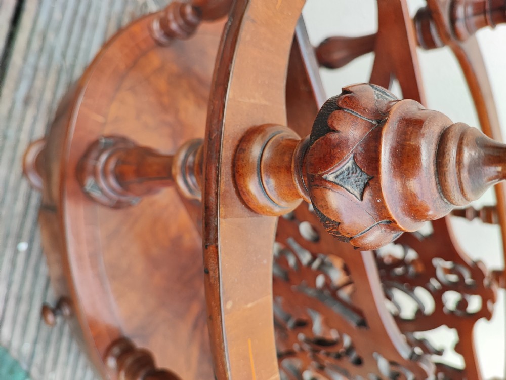 A superb oval Victorian walnut Canterbury. View IV