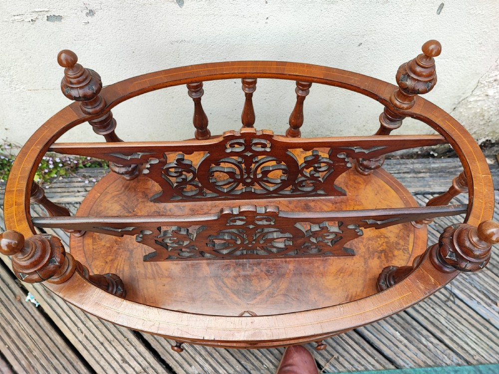 A superb oval Victorian walnut Canterbury. View V