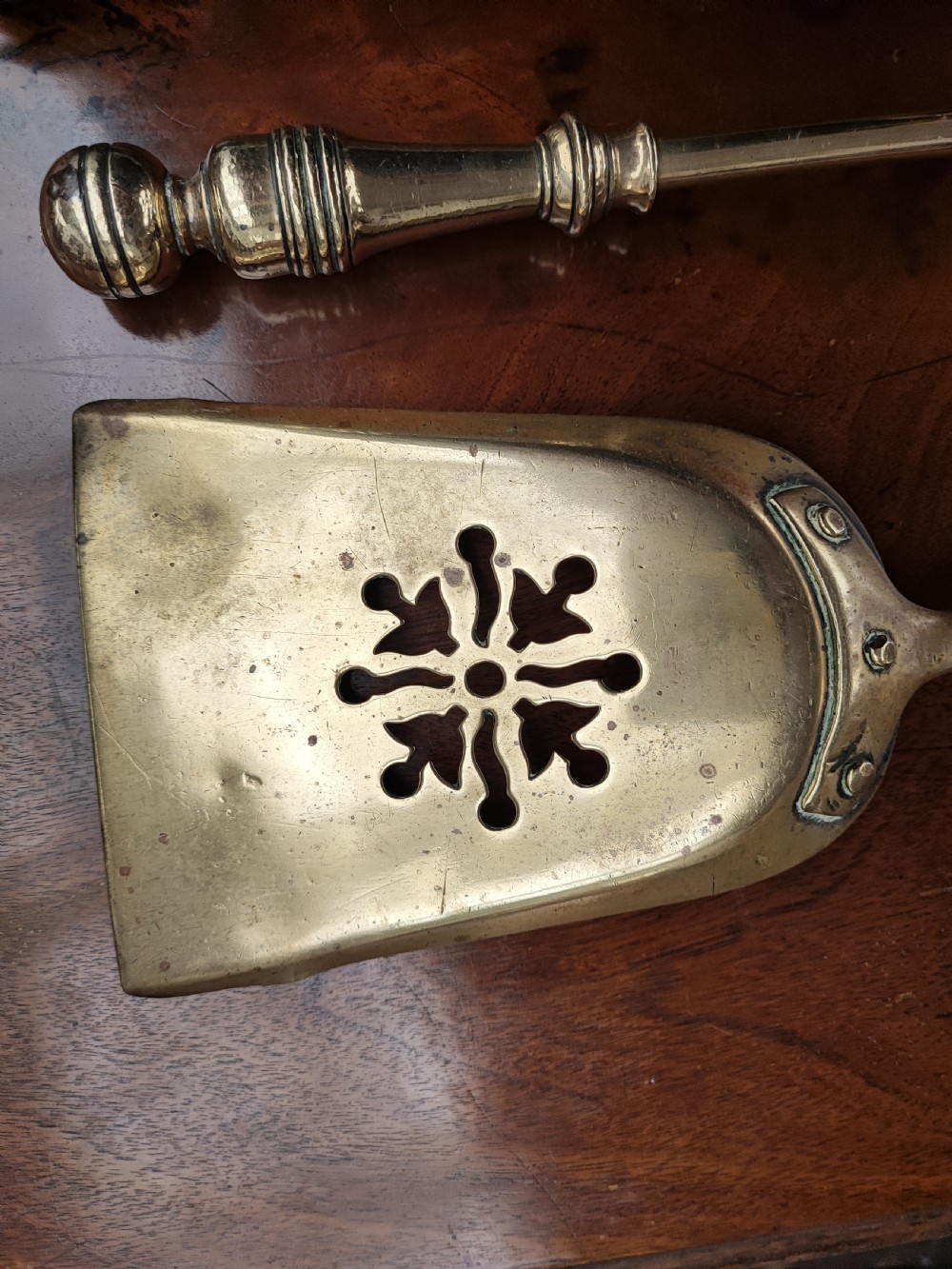 An antique of 3 brass fire irons of good quality. View II