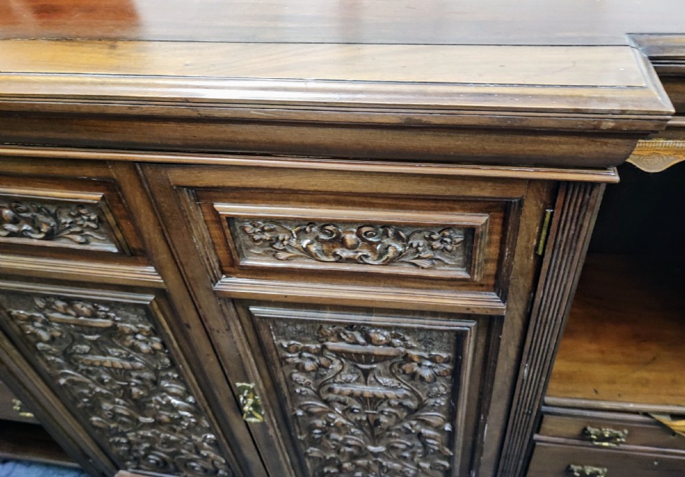A quality antique mahogany carved open bookcase. View VI