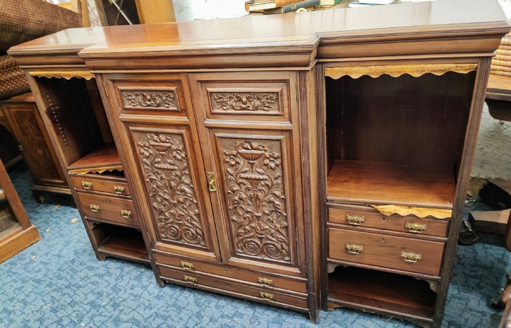 A quality antique mahogany carved open bookcase. View VII