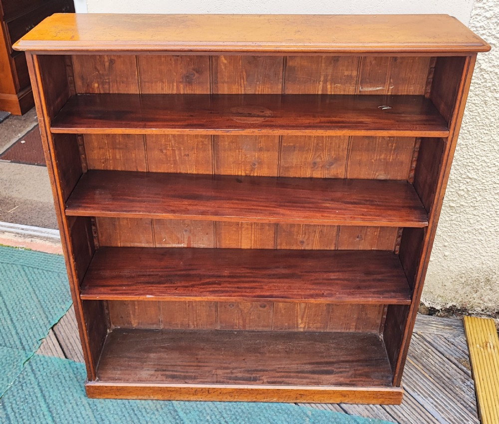 Antique mahogany open bookcase.