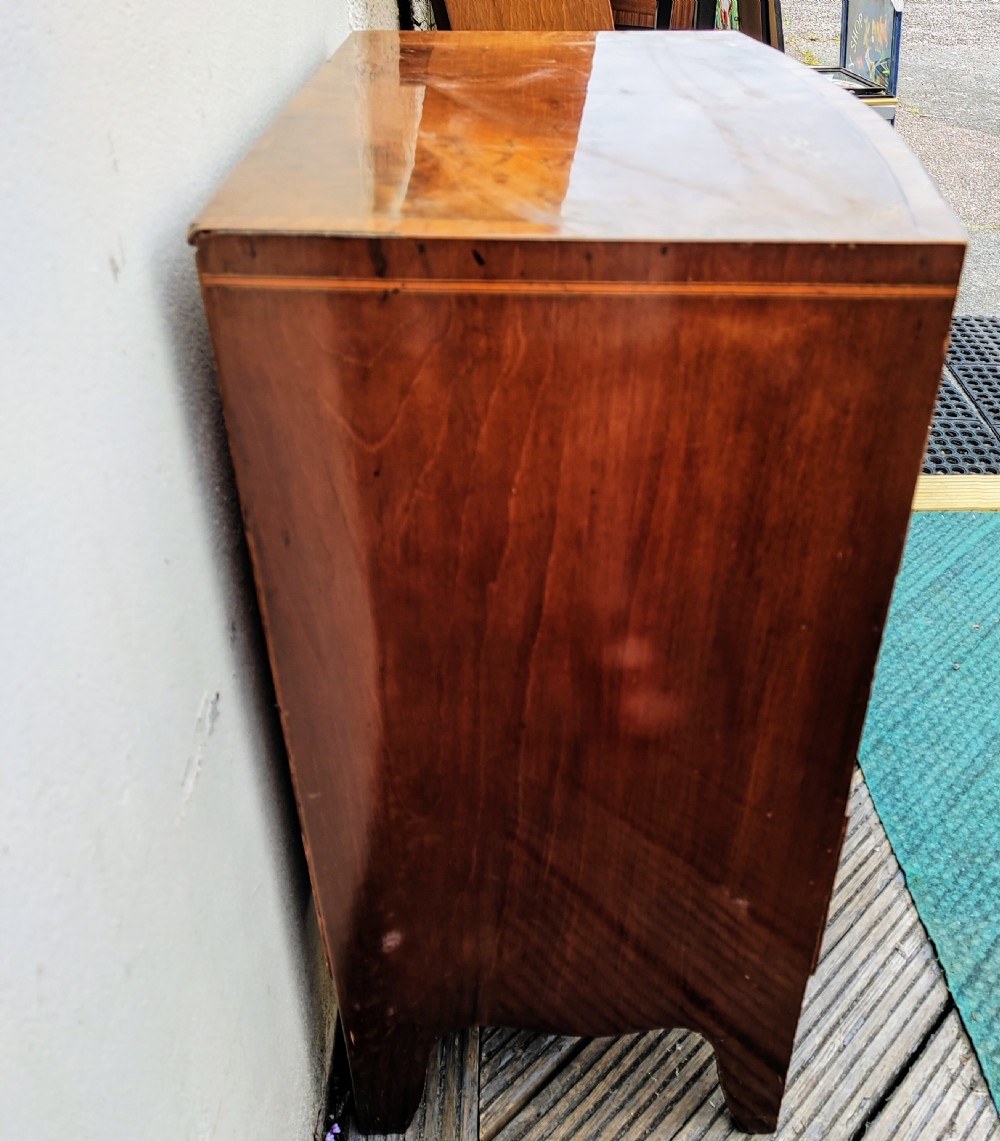 Regency mahogany inlaid bow front chest of drawers. View V