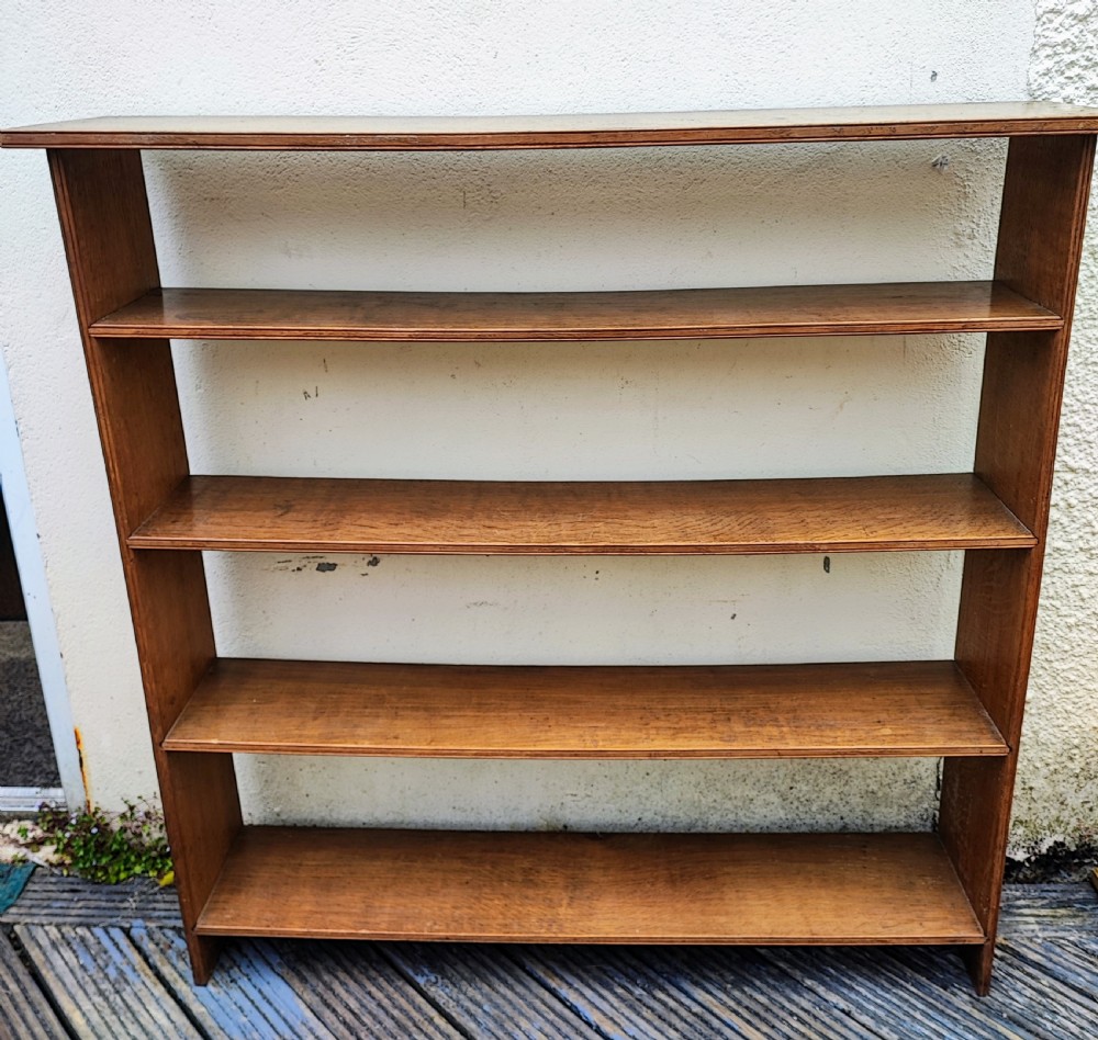 Edwardian golden oak open bookcase.
